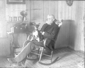 Uncle Finn enjoying the Victrola with his dog.