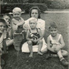 Esther with five young boys